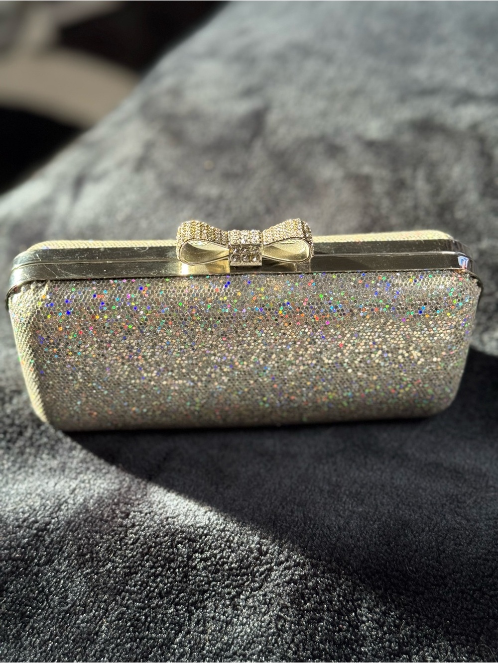 Claire's Silver Glitter Bow Clutch